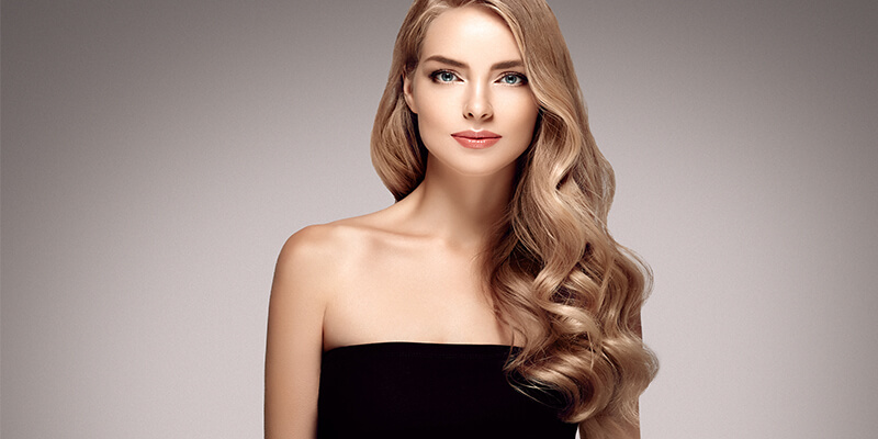 woman with ash blonde hair extensions